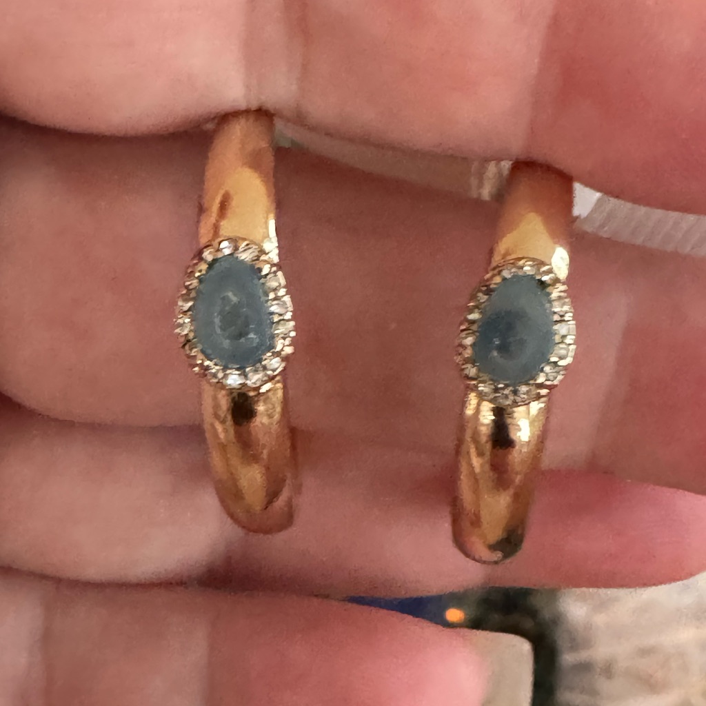 Gold Tone Open Hoop Earrings With Faux Diamonds Surrounding Blue Stone